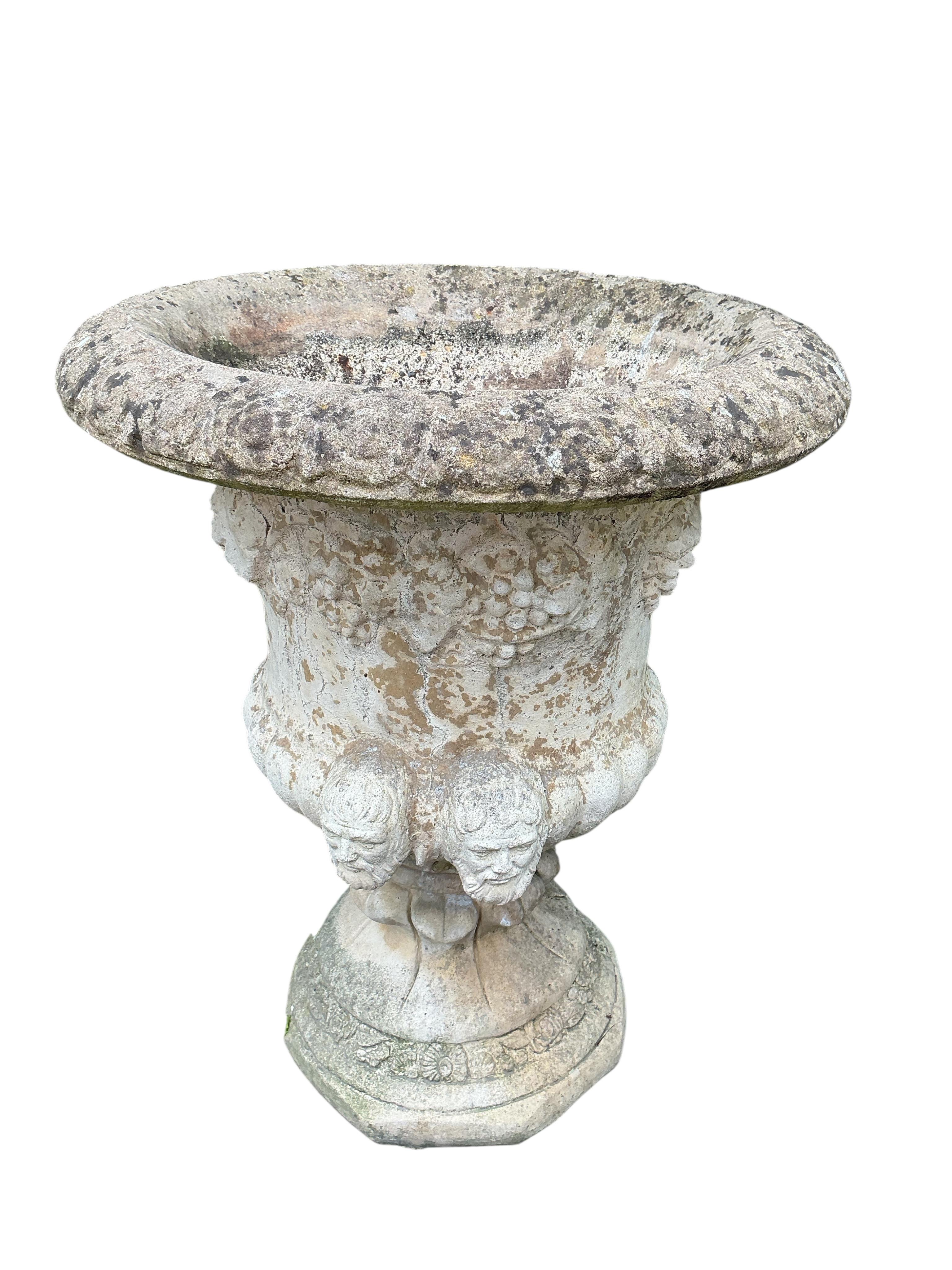 A pair of reconstituted stone campana garden urns, diameter 55cm, height 66cm